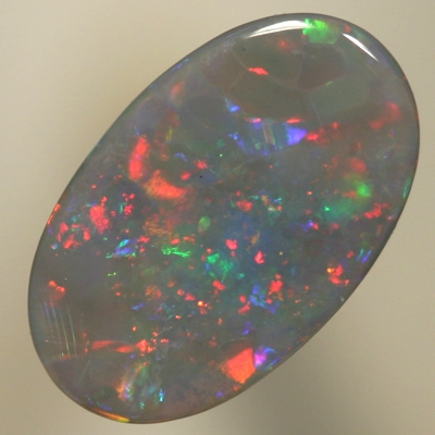 SOLID SEMI BLACK OPAL Sparkles of red hightlighted by green and blue